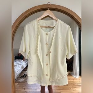 White flower with gold accent shirts